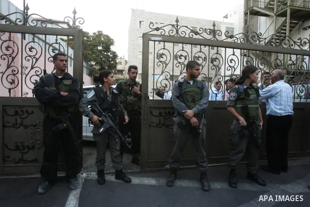 Israeli soldiers try to stop Palestinian conference, Jerusalem, Israel, on Sept. 25, 2011. Where Israeli police stormed a hotel in Jerusalem to prevent a Palestinian education curriculum conference. Photo by Mahfouz Abu...