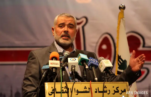 Palestinian Prime Minister in Gaza Strip, Ismail Haniya delivers speech in a press conference about the latest political developments and the energies of youth in the second scientists conference in Gaza city on Sept. 26...