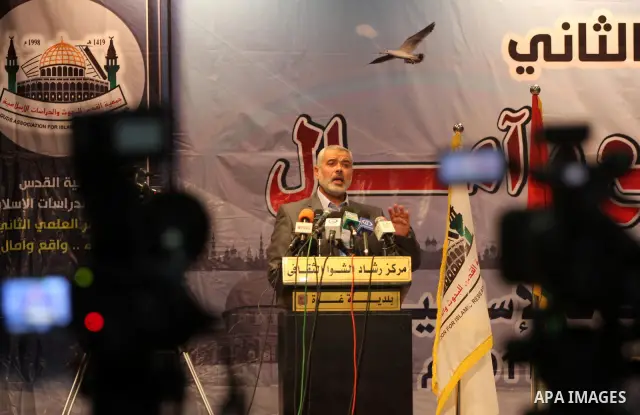 Palestinian Prime Minister in Gaza Strip, Ismail Haniya delivers speech in a press conference about the latest political developments and the energies of youth in the second scientists conference in Gaza city on Sept. 26...