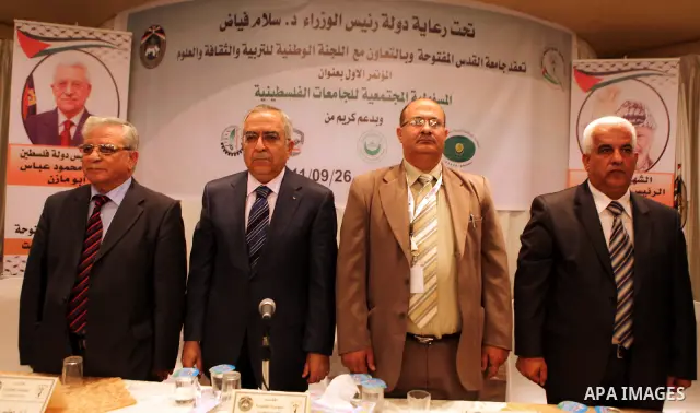 Palestinian Prime Minister, Salam Fayyad during the opening of the social responsibility of the Palestinian universities conference, where organized by Al-Quds Open University in the West Bank city of Nablus on Sept. 26,...