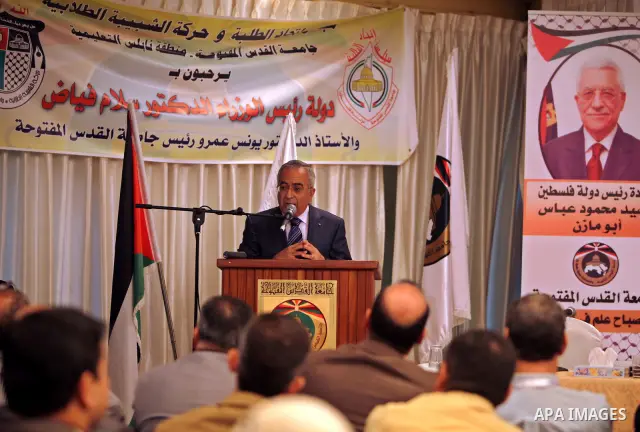 Palestinian Prime Minister, Salam Fayyad delivers speech during the opening of the social responsibility of the Palestinian universities conference, where organized by Al-Quds Open University in the West Bank city of Nab...