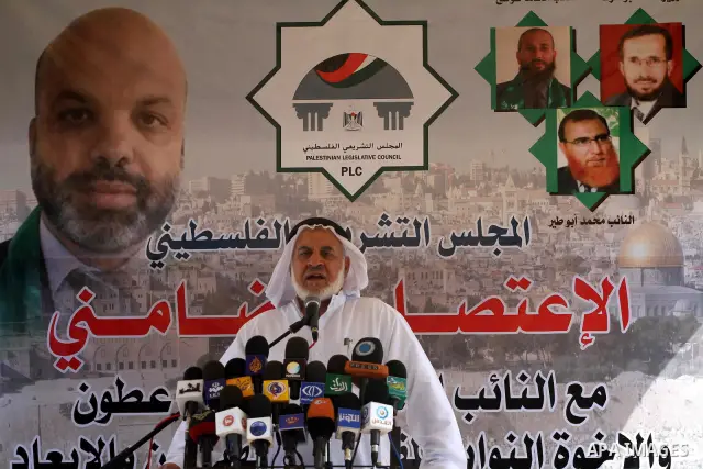 Member of the Palestinian Hamas legislators delivers speech in a press conference against arrested the member of Hamas legislative council, Ahmad Atun in an operation by undercover police officers in Gaza city on Sep. 27...