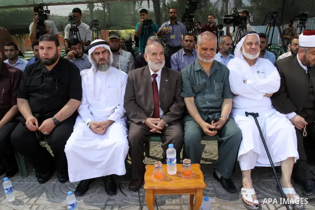 Palestinians take part in a protest against arrested the member of Hamas legislative council, Ahmad Atun in an operation by undercover police officers in Gaza city on Sep. 27, 2011. Atun is one of three senior Hamas MPs...