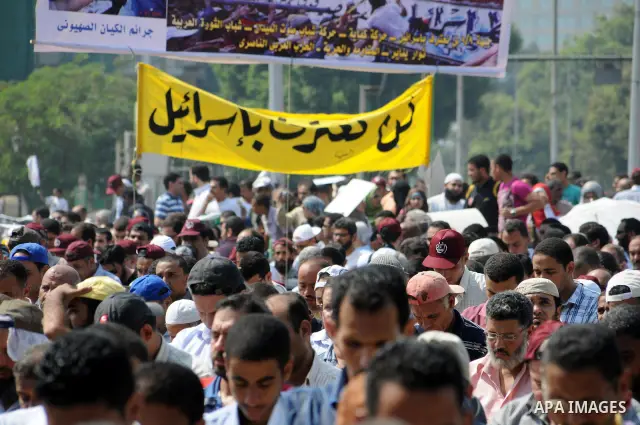 Egyptian demonstrators chant slogans during a protest at Tahrir Square in Cairo, Egypt, Friday, Sept. 30, 2011. Several thousand Egyptians are protesting against the country's military ruler's decision to retain the much...
