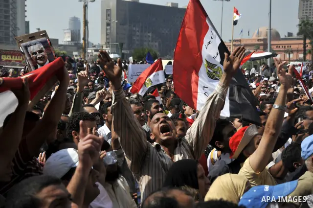 Egyptian demonstrators chant slogans during a protest at Tahrir Square in Cairo, Egypt, Friday, Sept. 30, 2011. Several thousand Egyptians are protesting against the country's military ruler's decision to retain the much...
