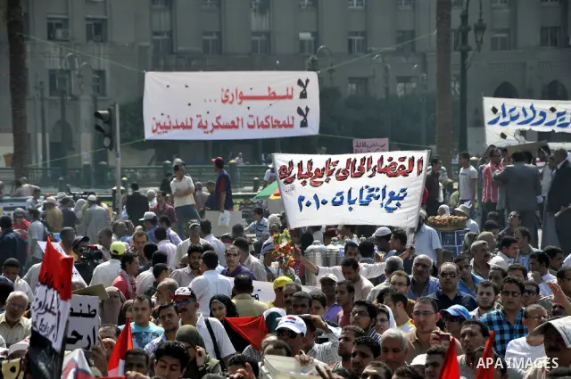 Egyptian demonstrators chant slogans during a protest at Tahrir Square in Cairo, Egypt, Friday, Sept. 30, 2011. Several thousand Egyptians are protesting against the country's military ruler's decision to retain the much...