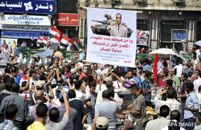Egyptian demonstrators chant slogans during a protest at Tahrir Square in Cairo, Egypt, Friday, Sept. 30, 2011. Several thousand Egyptians are protesting against the country's military ruler's decision to retain the much...
