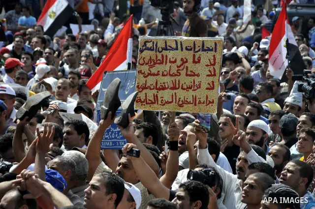 Egyptian demonstrators chant slogans during a protest at Tahrir Square in Cairo, Egypt, Friday, Sept. 30, 2011. Several thousand Egyptians are protesting against the country's military ruler's decision to retain the much...