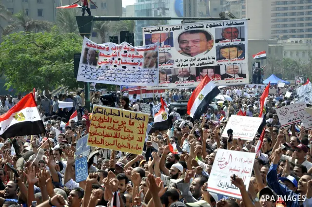 Egyptian demonstrators chant slogans during a protest at Tahrir Square in Cairo, Egypt, Friday, Sept. 30, 2011. Several thousand Egyptians are protesting against the country's military ruler's decision to retain the much...