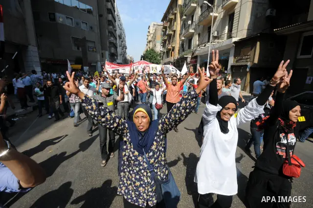 Egyptian demonstrators chant slogans during a protest at Tahrir Square in Cairo, Egypt, Friday, Sept. 30, 2011. Several thousand Egyptians are protesting against the country's military ruler's decision to retain the much...