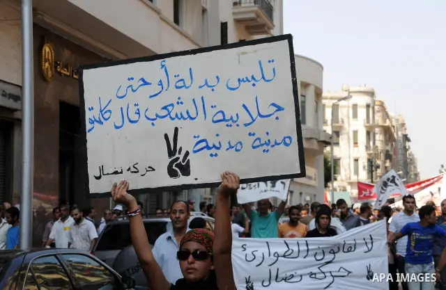 Egyptian demonstrators chant slogans during a protest at Tahrir Square in Cairo, Egypt, Friday, Sept. 30, 2011. Several thousand Egyptians are protesting against the country's military ruler's decision to retain the much...