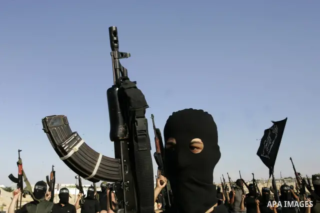 Palestinian militants from the Popular Resistance Movement participate in a training session in the southern Gaza Strip town of Khan Younis on Sept.30,2011. Israel on Tuesday approved construction of 1,100 homes for Jews...