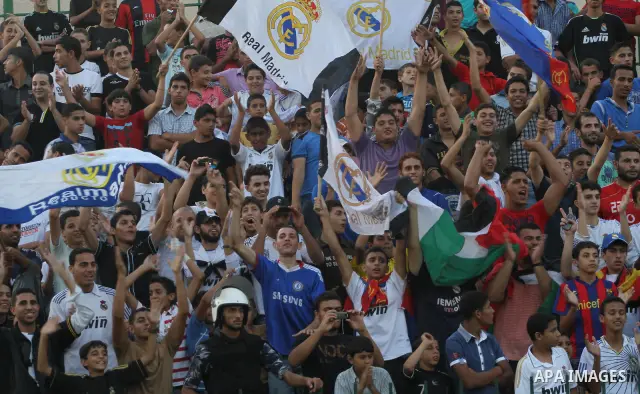 Spanish team Barcelona celebrates the victory over arch-rivals Real Madrid on penalties after the end of the game, where held on the stadium Palestine in Gaza city on Friday, on Sep. 30, 2011. The Ministry of Youth and S...