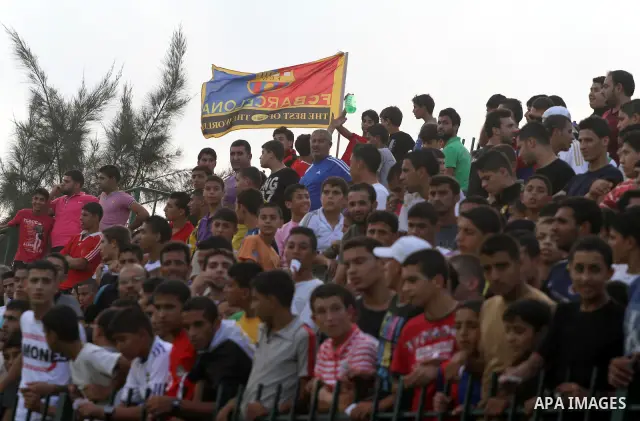 Spanish team Barcelona celebrates the victory over arch-rivals Real Madrid on penalties after the end of the game, where held on the stadium Palestine in Gaza city on Friday, on Sep. 30, 2011. The Ministry of Youth and S...