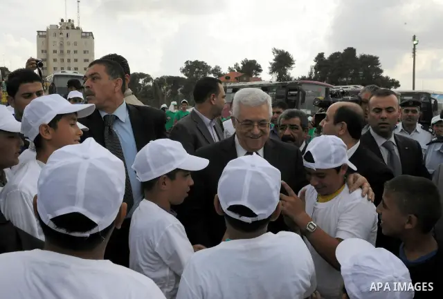 Palestinian President Mahmoud Abbas (Abu Mazen) during his visit to the events hosted by the children of Palestine to support the efforts of the Palestinian leadership at the United Nations, in the West Bank city of Rama...