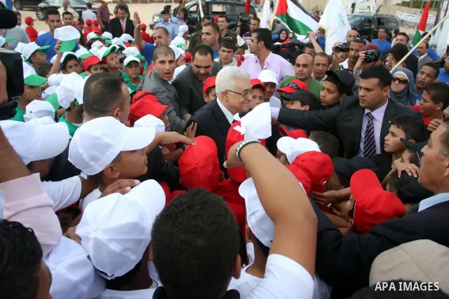 Palestinian President Mahmoud Abbas (Abu Mazen) during his visit to the events hosted by the children of Palestine to support the efforts of the Palestinian leadership at the United Nations, in the West Bank city of Rama...