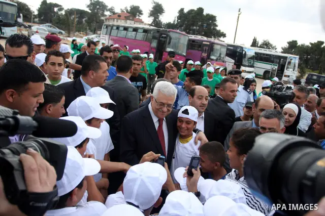 Palestinian President Mahmoud Abbas (Abu Mazen) during his visit to the events hosted by the children of Palestine to support the efforts of the Palestinian leadership at the United Nations, in the West Bank city of Rama...