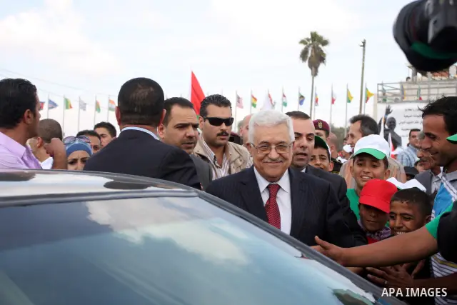 Palestinian President Mahmoud Abbas (Abu Mazen) during his visit to the events hosted by the children of Palestine to support the efforts of the Palestinian leadership at the United Nations, in the West Bank city of Rama...