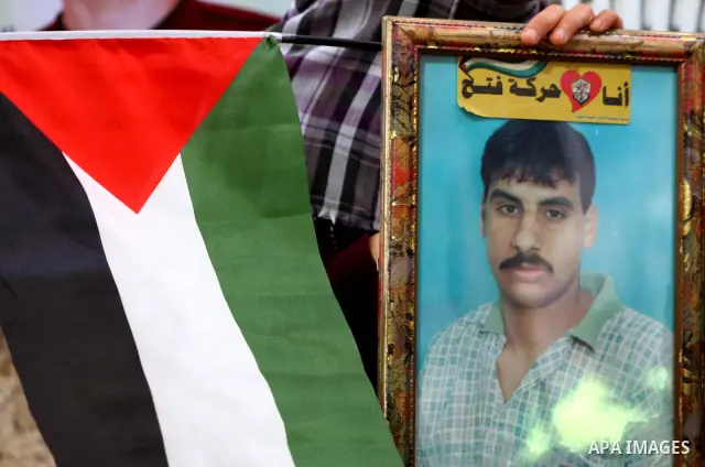 Families of Palestinian prisoners held in Israeli jails protest outside the International Committee of the Red Cross (ICRC) offices in Gaza City on October 2, 2011 in support of prisoners on hunger strike. Photo by Ashra...