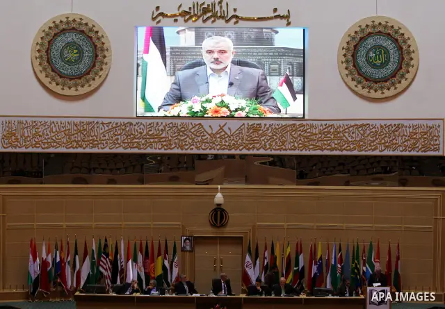 Palestinian Prime Minister in Gaza strip, Ismail Haniya delivers speech through video conferencing, during the Fifth International conference to support the Palestinian Intifada, in Tehran, "Iran" on Oct. 1-2, 2011. Phot...