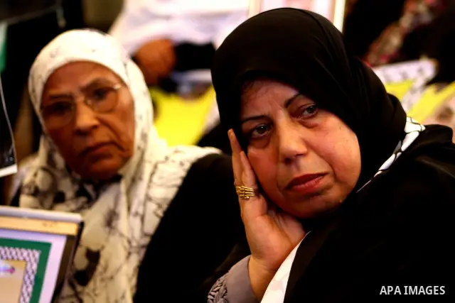 Palestinians take part in a protest at the Red Cross headquarters in Gaza City on October 3, 2011, to show their solidarity with Palestinian prisoners held in Israeli jails. On Wednesday, Palestinian prisoners in Israel...