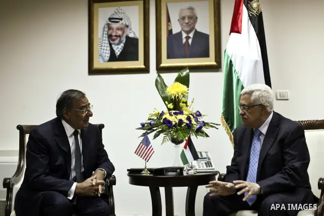 Palestinian President Mahmoud Abbas (Abu Mazen) meets with U.S. Defence Secretary Leon Panetta upon his arrival in the West Bank city of Ramallah on Oct. 3, 2011. Photo by Fadi Arouri / Pool
