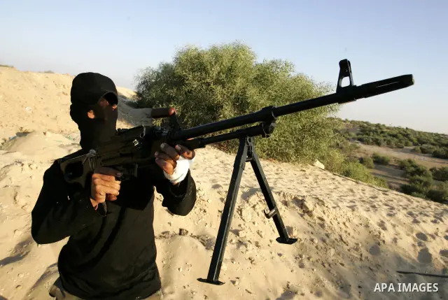 Palestinian militants with the Democratic Front for the Liberation of Palestine (DFLP) take part in a training session in the southern Gaza Strip town of Khan Yunis on October 03, 2011. Photo by Abed Rahim Khatib