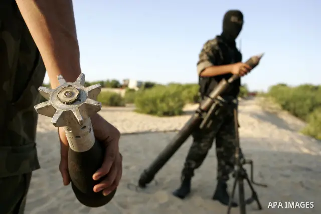 Palestinian militants with the Democratic Front for the Liberation of Palestine (DFLP) take part in a training session in the southern Gaza Strip town of Khan Yunis on October 03, 2011. Photo by Abed Rahim Khatib