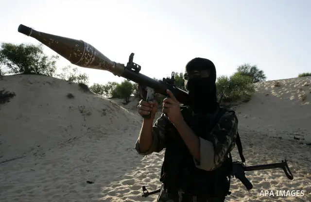 Palestinian militants with the Democratic Front for the Liberation of Palestine (DFLP) take part in a training session in the southern Gaza Strip town of Khan Yunis on October 03, 2011. Photo by Abed Rahim Khatib