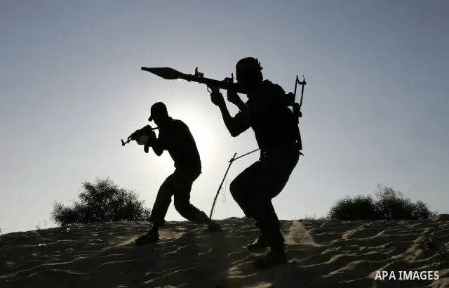 Palestinian militants with the Democratic Front for the Liberation of Palestine (DFLP) take part in a training session in the southern Gaza Strip town of Khan Yunis on October 03, 2011. Photo by Abed Rahim Khatib