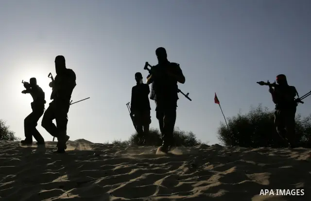 Palestinian militants with the Democratic Front for the Liberation of Palestine (DFLP) take part in a training session in the southern Gaza Strip town of Khan Yunis on October 03, 2011. Photo by Abed Rahim Khatib
