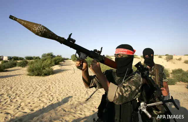 Palestinian militants with the Democratic Front for the Liberation of Palestine (DFLP) take part in a training session in the southern Gaza Strip town of Khan Yunis on October 03, 2011. Photo by Abed Rahim Khatib