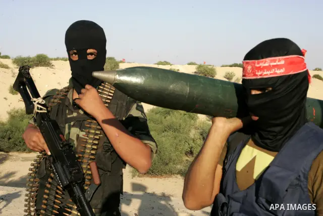 Palestinian militants with the Democratic Front for the Liberation of Palestine (DFLP) take part in a training session in the southern Gaza Strip town of Khan Yunis on October 03, 2011. Photo by Abed Rahim Khatib