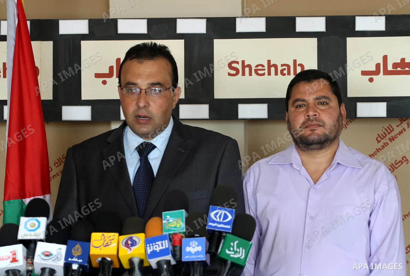 Memeber of th Palestinian Ministry of Culture delivers speech in a press conference talking about the international book exhibition, will be inaugurated tomorrow, Wensday, despite the obstacles, in Gaza city on Oct. 4, 2...