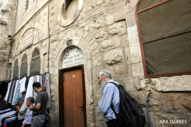 A view to the jewish houses in Jerusalem's old city on Oct. 4,2011. Jewish celebrate Kapparot which begins by reciting a prayer and then spinning the bird over their head to release the sins accumulated over the past yea...