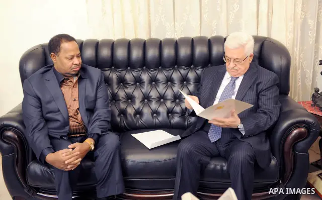 Palestinian President Mahmoud Abbas (Abu Mazen) meets with Minister of State for Presidential Affairs of Senegal, Ahmed Khalifa in the West Bank city of Ramallah on Oct. 4,2011. Photo by Thaer Ganaim