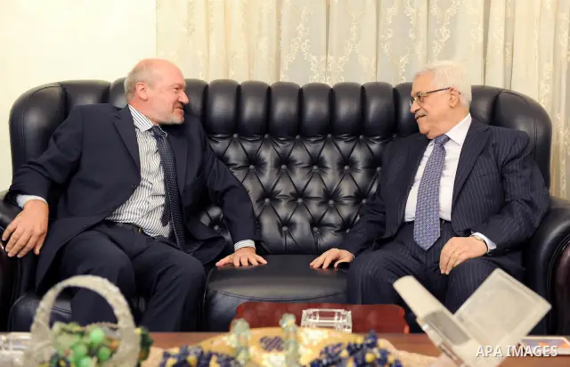 Palestinian President Mahmoud Abbas (Abu Mazen) meets with the French Consul in Amman on Oct. 4,2011. Photo by Thaer Ganaim