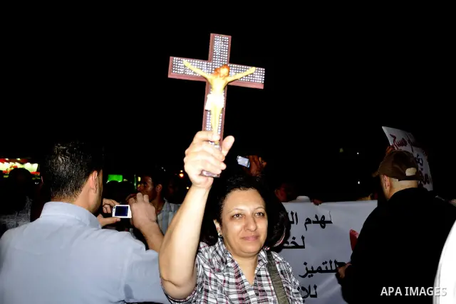 Hundreds of Egyptian Coptic Christians demonstrate outside the High Court building in Cairo on Oct. 4, 2011, because of the burning of Aswan Church. Photo by Ahmed Asad