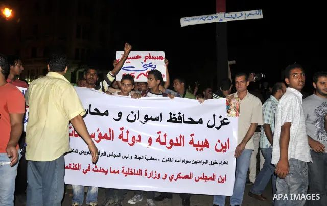Hundreds of Egyptian Coptic Christians demonstrate outside the High Court building in Cairo on Oct. 4, 2011, because of the burning of Aswan Church. Photo by Ahmed Asad
