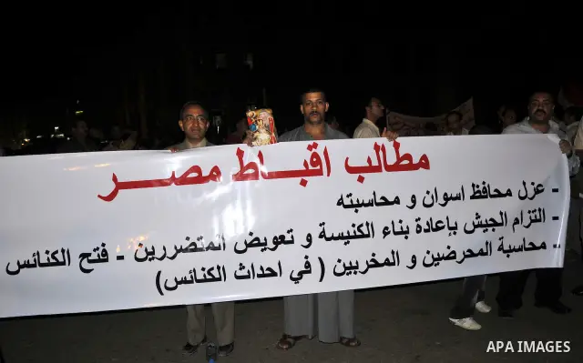 Hundreds of Egyptian Coptic Christians demonstrate outside the High Court building in Cairo on Oct. 4, 2011, because of the burning of Aswan Church. Photo by Ahmed Asad