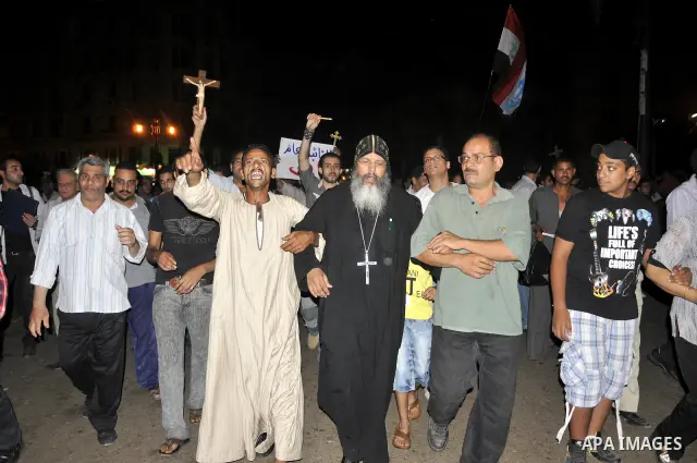 Hundreds of Egyptian Coptic Christians demonstrate outside the High Court building in Cairo on Oct. 4, 2011, because of the burning of Aswan Church. Photo by Ahmed Asad
