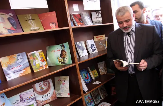 Palestinian Prime Minister in Gaza Strip, Ismail Haniya attends the opening ceremony of the book fair which organised by the Ministry of Culture in Gaza city on Oct. 5,2011. Photo by Mohammed Asad