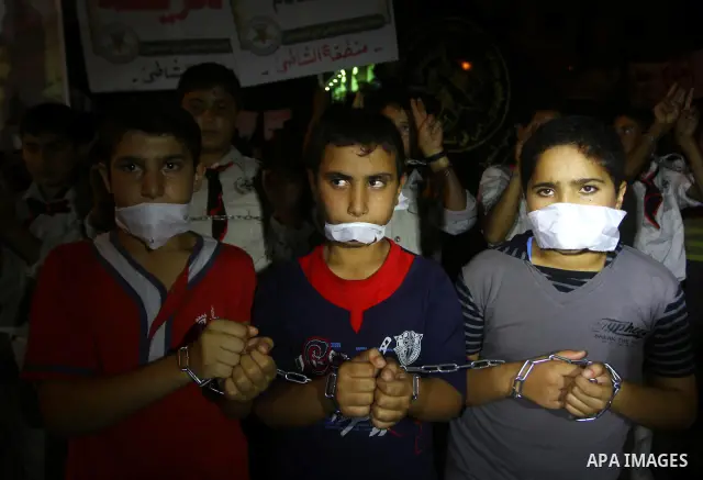 Palestinian Jihad Islamic supporters take part in a protest in Gaza city October 5, 2011, to show their solidarity with Palestinian prisoners held in Israeli jails. Hundreds of Palestinians in Israeli jails have joined a...
