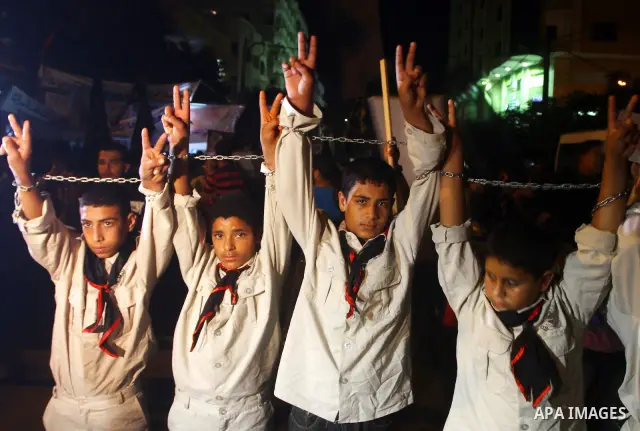 Palestinian Jihad Islamic supporters take part in a protest in Gaza city October 5, 2011, to show their solidarity with Palestinian prisoners held in Israeli jails. Hundreds of Palestinians in Israeli jails have joined a...