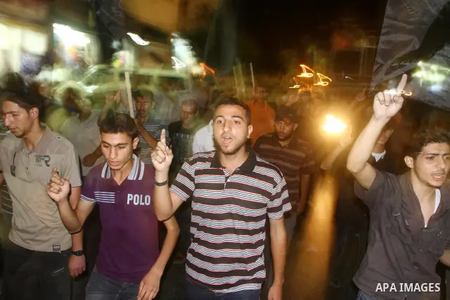 Palestinian Jihad Islamic supporters take part in a protest in Gaza city October 5, 2011, to show their solidarity with Palestinian prisoners held in Israeli jails. Hundreds of Palestinians in Israeli jails have joined a...