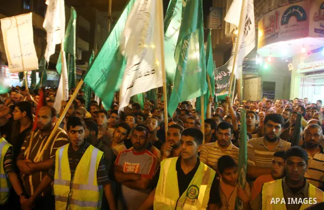 Palestinian Hamas supporters take part in a protest in Gaza city October 5, 2011, to show their solidarity with Palestinian prisoners held in Israeli jails. Hundreds of Palestinians in Israeli jails have joined a hunger...