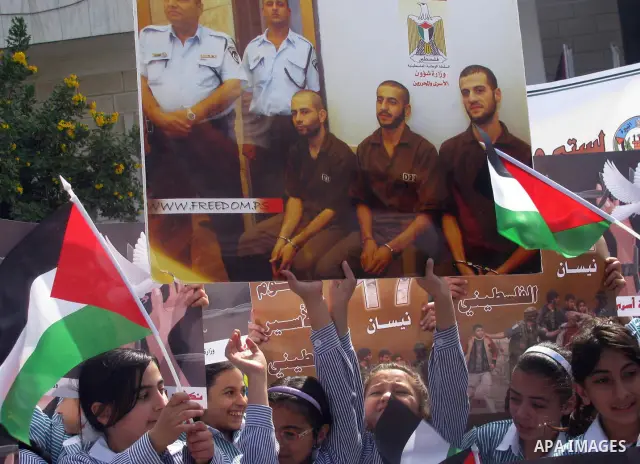 Palestinian children attend a demonstration calling for the release of prisoners held in Israeli jails and in support of inmates in hunger strike, on Oct, 06, 2011 in the West Bank city of Ramallah. Thousands of Palestin...