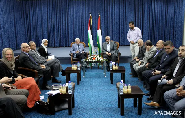 Palestinian Prime Minister in Gaza Strip, Ismail Haniya meets with a Dutch human rights delegation at his office in Gaza city on Oct. 6,2011. Photo by Mohammed Asad