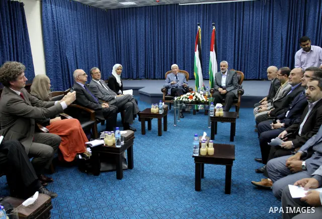 Palestinian Prime Minister in Gaza Strip, Ismail Haniya meets with a Dutch human rights delegation at his office in Gaza city on Oct. 6,2011. Photo by Mohammed Asad