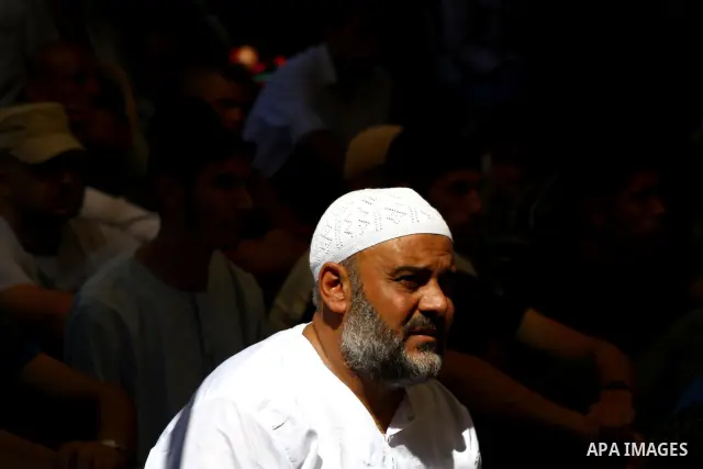 Palestinian Muslim worshippers attend Friday prayer next to the Red Cross building in Gaza City as they call for the release of Palestinian prisoners from Israeli jails and support of inmates in hunger strike on October...